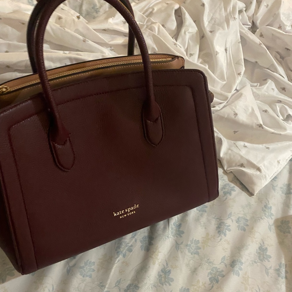 Kate spade large Knott satchel purse with storage bag never used and tag on.